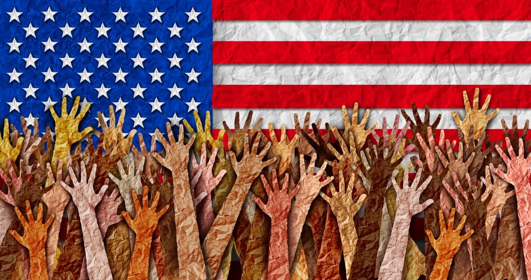 raised hands before USA flag